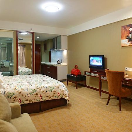 Hangzhou Edinburgh Holiday Hotel Quarto foto